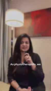 Physiotherapist demonstrating Aasra side-opening tearaway shorts on a patient
